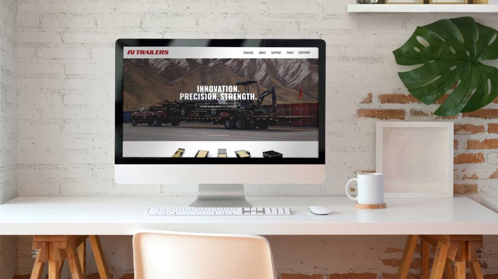 PJ_Computer Desktop computer displaying the PJ Trailers website